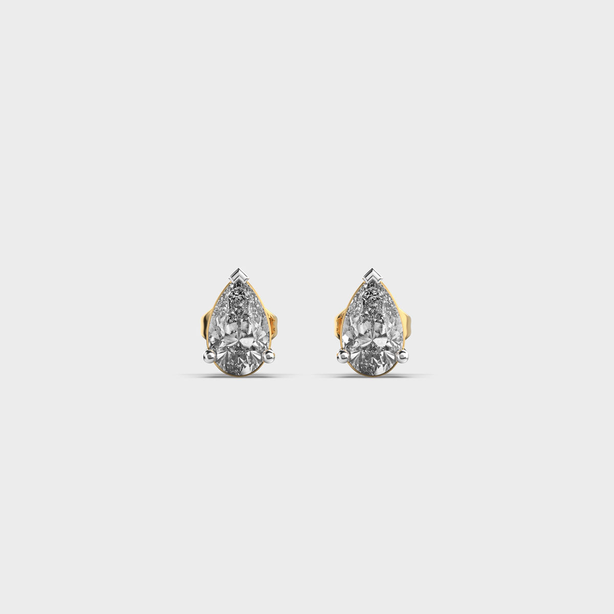 Dainty Pear Cut Diamond Studs
